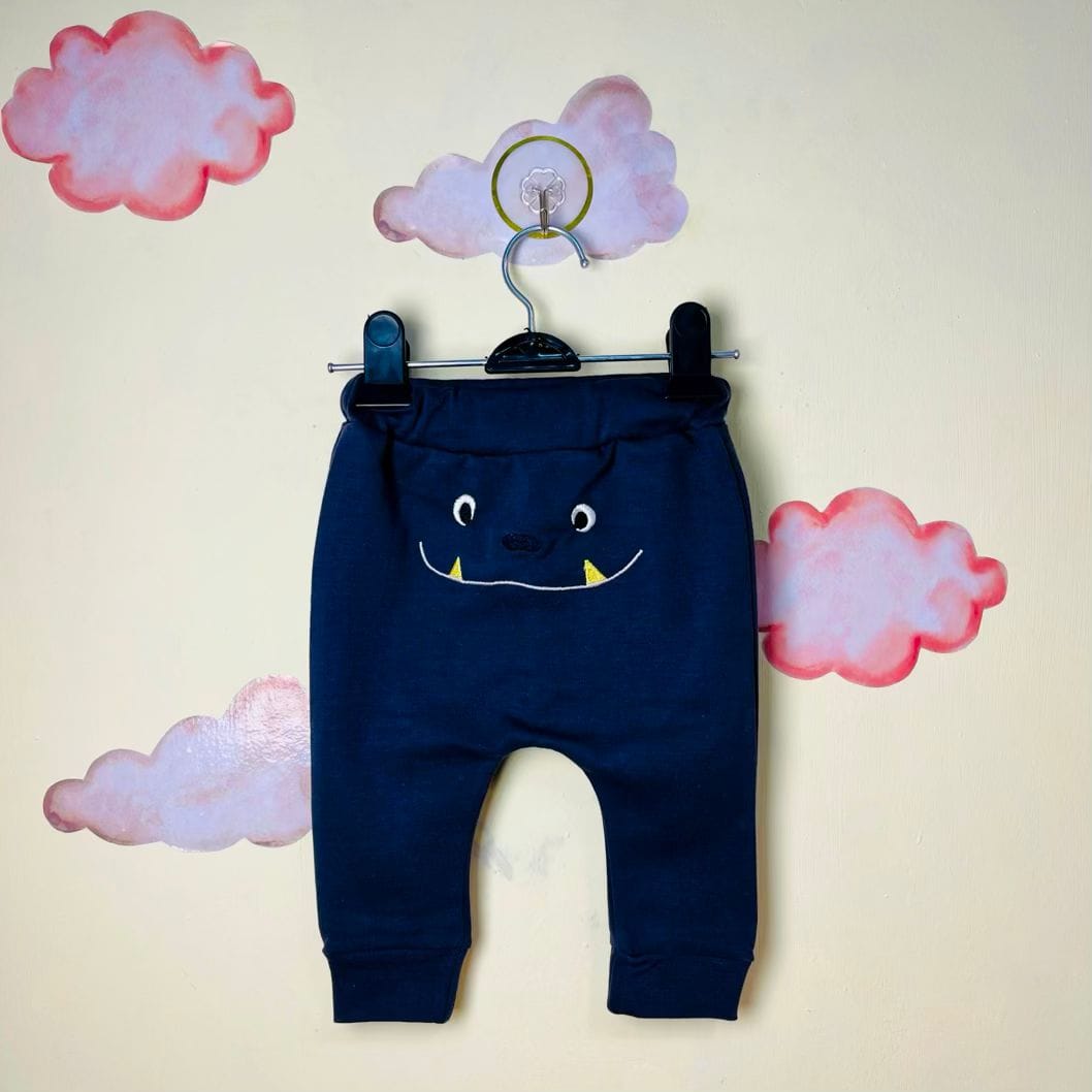 شلوار نوزادی پسرانه طرح هیولا سرمه ای رنگ