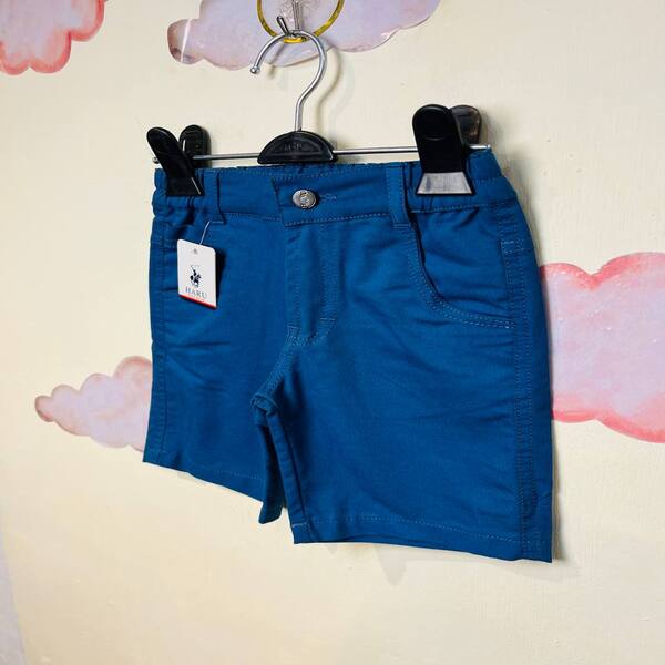 5814697910296316693 شلوارک کتان نوزادی پسرانه آبی کلاسیک از نمای کنار